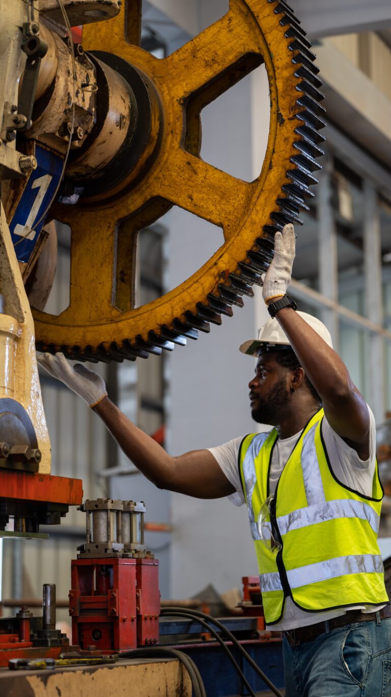 Picture of someone performing preventative maintenance on a handling system